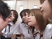 Four Japanese school girls spitting on teacher