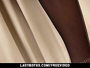 Long-haired ladyboy in black fishnet stockings pumps her...
