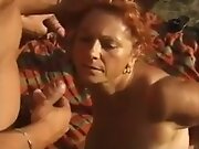 Mature outdoor piss gang bang