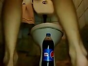 Liter bottle into the anal opening