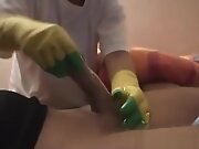 Housewife In Yellow Rubber Gloves Gives Handjob With Oil