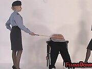 Uniformed whipping femdoms lashing sub ass in 3some