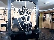Latex Slave Tied Up In Bondage