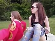 Skinny girls masturbate together in nature